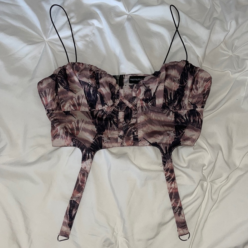 pink crop top with butterflies from pretty little thing
